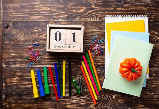 A calendar with specific dates highlighted for SAT study sessions. Colorful sticky notes are attached, each detailing a different study topic for the day.