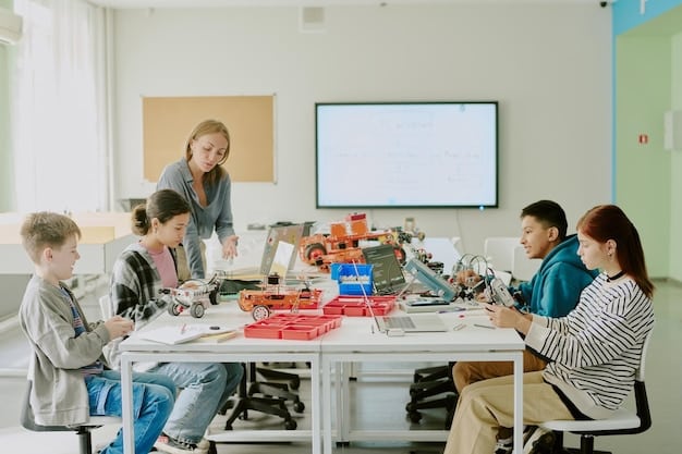 A classroom scene showcasing middle school students working collaboratively on a robotics project, with one student programming a robot using a laptop while others observe and assist, surrounded by disassembled robot parts and tools.