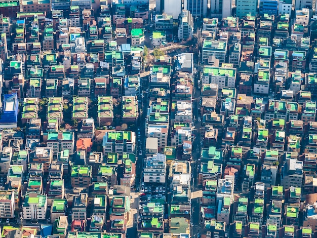 Aerial view of a mixed-use commercial property, with annotations highlighting the diversity of tenants and potential tax implications based on the new regulations.