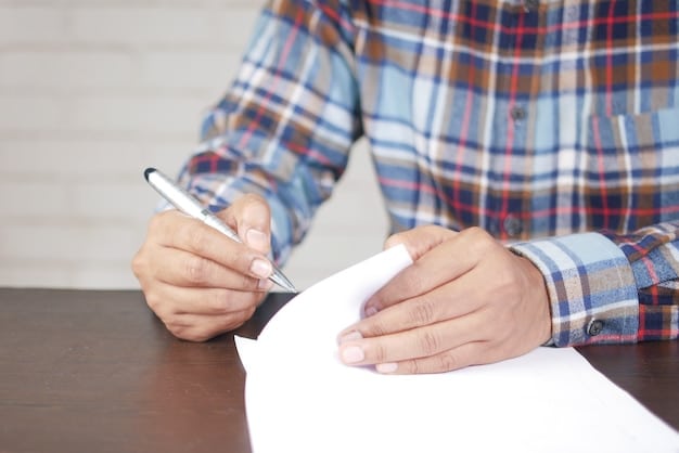 A photograph showing a person filling out an SSI application form with a pen, with a laptop displaying the Social Security Administration website in the background, emphasizing both traditional and digital application methods.